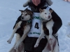 First place winner Conway Seavey poses at the finish line with his lead dogs Sarge (R) at the finish line of the 2014 Jr. Iditarod Sled Dog Race at Happy Trails Kennel, Big Lake, Alaska
Sunday February 23, 2014 

Junior Iditarod Sled Dog Race 2014
PHOTO BY JEFF SCHULTZ/IDITARODPHOTOS.COM  USE ONLY WITH PERMISSION